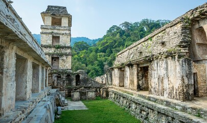 Scenic view of Palenque ruins and pyramids under blue sky in Mexico