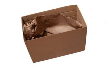 Open delivery box with protective paper cushioning on white background