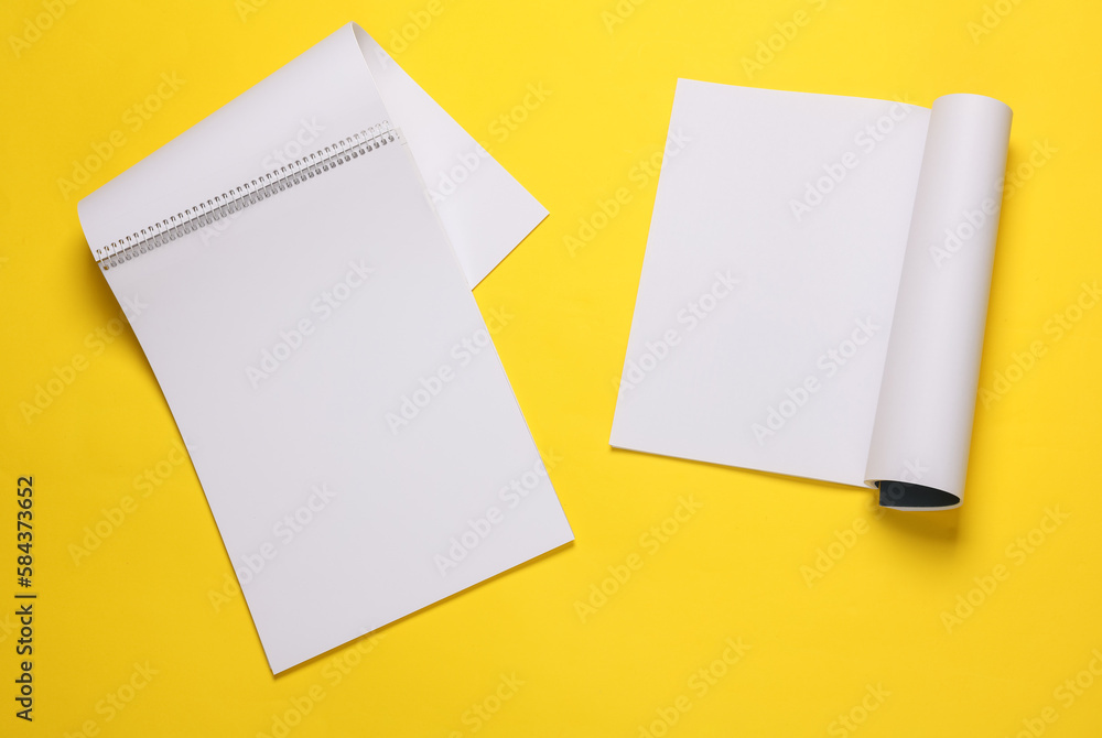 Poster sketchbook and notebook or magazine mockup with white pages on yellow background. template for desig