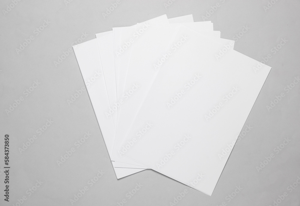 Poster white blank sheets of a4 paper size or documents mockup on a gray background. template for design