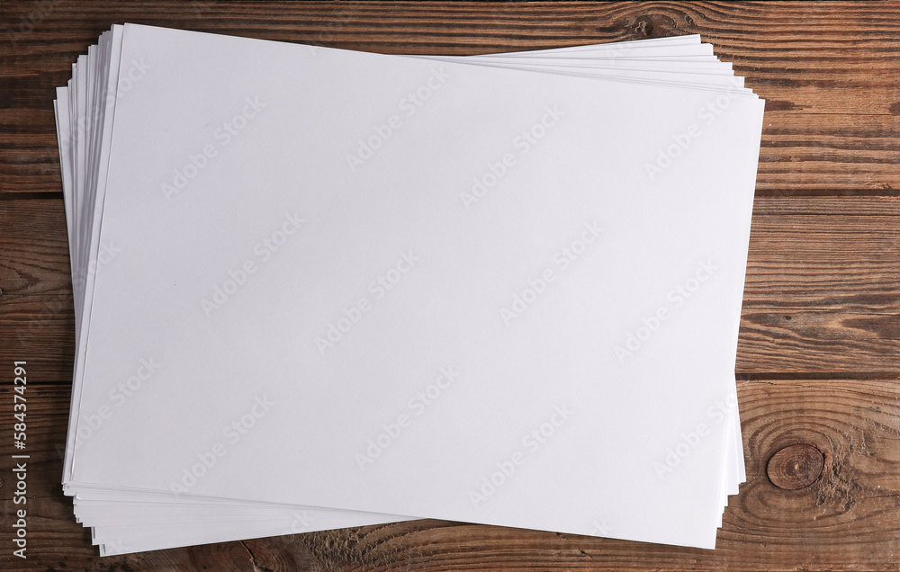 Poster white blank sheets of a4 paper size or documents mockup on wooden table. template for design