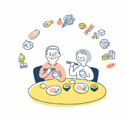 食事をしているシニアカップルとさまざまな食材のアイコン