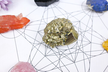 Healing crystal pyrite fool gold and white sages herb sticks for clearing negative energy on Metraton cube. Mind and soul spirit. Spiritual new age mindfulness