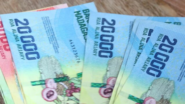 Madagascar money, counting cash, financial and economic concept