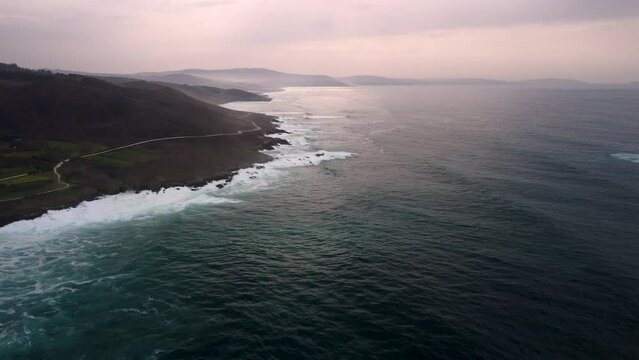 Idyllic View Of Beach Caion With Frothy Waves Onto Shoreline In Coruna, Spain. Aerial Wide Shot