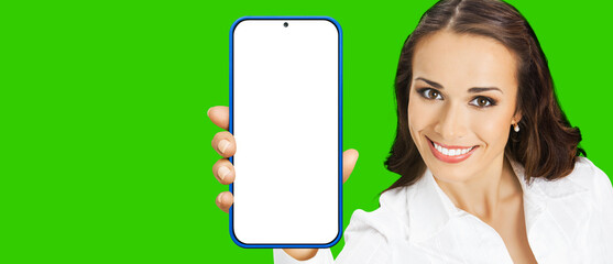 Portrait image of happy smiling young woman in confident cloth, holding show smartphone cell phone...