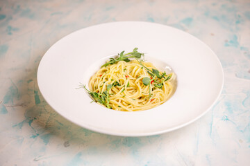 top view of the pasta of hard varieties in a white plate