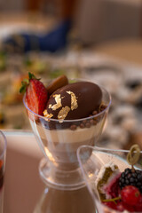 dessert in a plastic basket on the buffet table