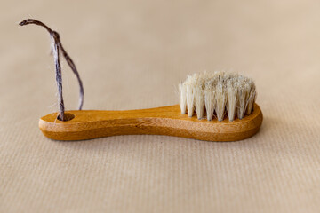 Wooden brush with natural bristles for face and body, the concept of using eco-friendly materials