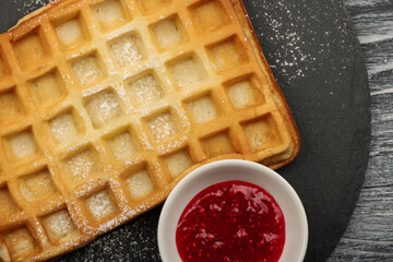 American or Belgian waffle with raspberry jam