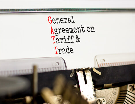 GATT symbol. Concept words GATT general agreement on tariff and trade typed on retro typewriter on beautiful white background. Business GATT general agreement on tariff and trade concept. Copy space.