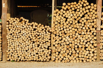stacked logs on top of each other, stack of firewood
