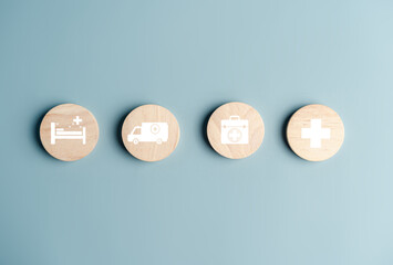 Health insurance concept. health care icon on wooden block, health and access to welfare concept...