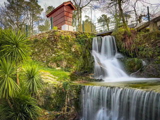 Chouso waterfall in the Uima river in Caldas de Sao Jorge - Santa Maria da Feira, Aveiro, Portugal.