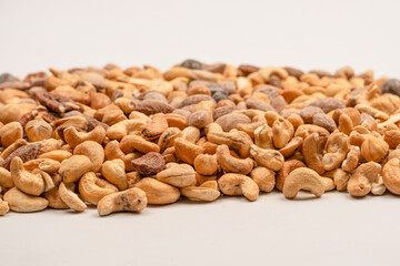 A group of almonds, pistachios, walnuts, macadamia, cashews.
