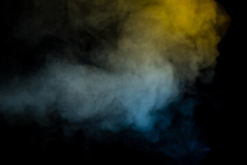 Blue and yellow steam on a black background.