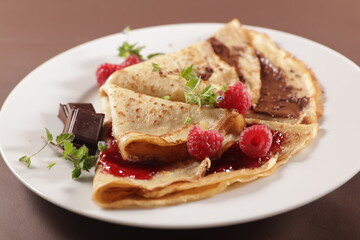 crepe with chocolate and raspberry jam