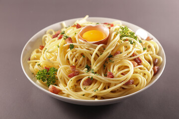 bowl of tagliatelle with egg and bacon