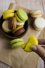 macaroons on a wooden table bite