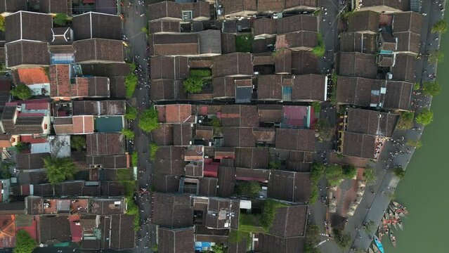 Hoi An rooftop high 2-7 - Aerial drone footage above the old iconic city of Hoi An, Vietnam. Under Unesco Heritage since 1985 this beautiful town attracts thousand tourists daily