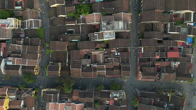 Hoi An rooftop high 4-7 - Aerial drone footage above the old iconic city of Hoi An, Vietnam. Under Unesco Heritage since 1985 this beautiful town attracts thousand tourists daily