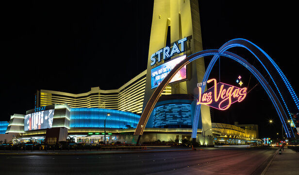 Las Vegas, United States - November 22, 2022: A picture of the STRAT Hotel, Casino and SkyPod and Las Vegas Boulevard Gateway Arches at night.