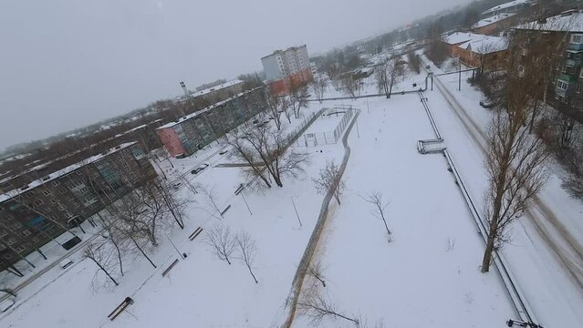 FPV shooting of snow removal equipment, snow removal machine operation, snow removal equipment, mtz tractor removes snow