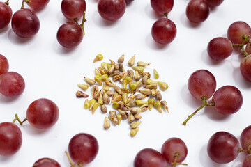 Fresh grape with seeds on white background.