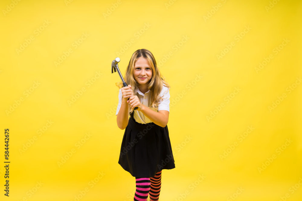 Wall mural future engineer. happy kid use hammer repairing tool. building construction site.