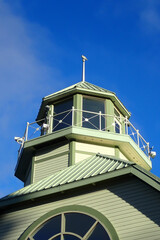 Lighthouse lantern room with blue sky background