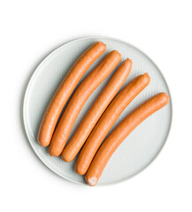Tasty sausages. Frankfurters on plate isolated on white background.