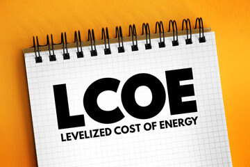 LCOE - Levelized Cost Of Energy acronym text on notepad, abbreviation concept background