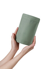 Woman's hands hold cardboard packages for tea or snacks on a transparent background. Tea branding...