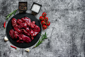 raw liver on stone background with copy space for your text