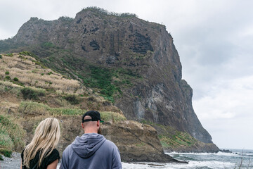madeira sea rock view summer travel tourism vacation clif geology nature mountain peak happy couple man woman together stand