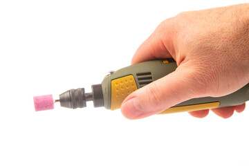 graver and drilling electric tool on a white background. dremel for processing materials and repairing parts