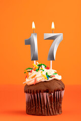 Birthday cake with candle number 17 - Orange foamy background