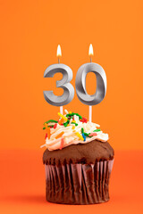 Candle number 30 - Cake birthday in orange background