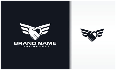 Handshake logo forming love with wings
