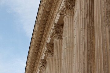 detail of the façade of the old Roman Temple in Nimes, France (Maison carrée, Nimes)