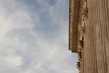 Roman columns on the façade of the ancient Roman Temple Maison carrée  in southern France with...