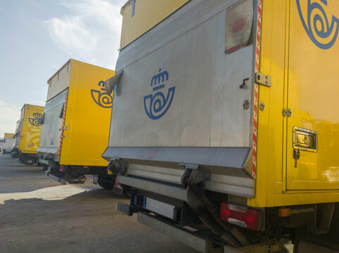 Merida - Spain - Correos fleet parked outdoors.