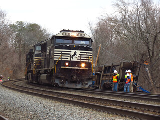 Ayer, Massachusetts/USA - 3/23/2023 - Norfolk Southern locomotives work to put together the rest of...