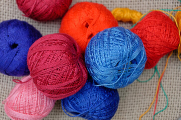 multi-colored skeins of thread. needlework threads, close-up