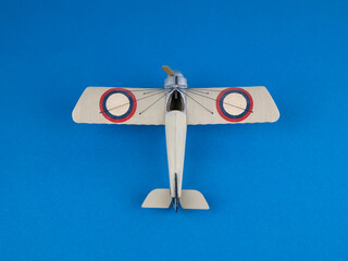 Plastic model of the Morane Saulnier plane, top view. Miniature of fighter plane. Building model aircraft