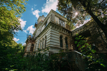 Fototapeta na wymiar Old overgrown abandoned Philippov Mansion in Moscow Region, Russia