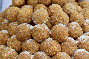 Closeup of Methi laddu for sale at market place
