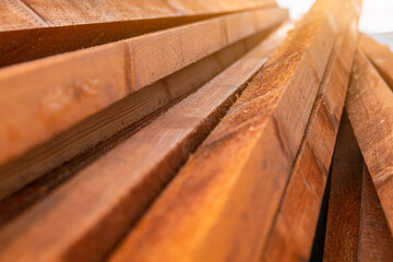 Many wooden boards for construction treated with a special protective oil