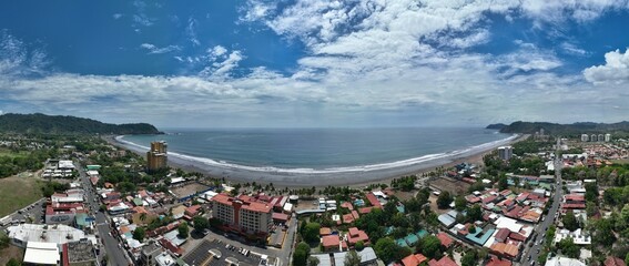 From above, Jaco Beach in Costa Rica is a stunning sight: white sands, blue waters, and lush greenery lining the shore.