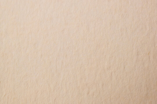 Gray dusty beige cardboard texture, eggshell color paper background